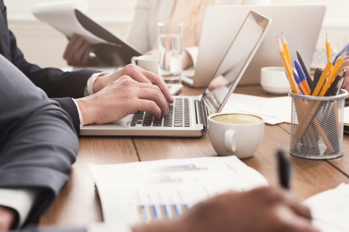 A marketing team collaborating at a desk